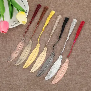Factory wholesale Creative Gift Metal Feather Bookmark Retro Wind Angel Feather Brass Bookmark With Tassel Custom Book marks