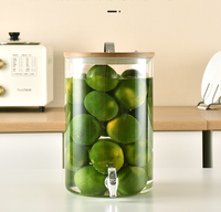 Distributeur de boissons en verre borosilicaté résistant à l'humidité scellé et résistant aux hautes températures avec robinet en ABS pour jus de vin et cola