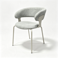 Chaise de salle à manger haut de gamme avec dossier incurvé et accoudoirs courbes, en velours luxueux, pour table à manger