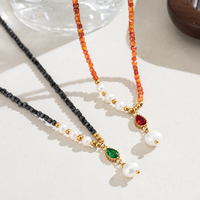 Nouveaux accessoires : Collier tendance bohème avec pendentif goutte en perle d'eau douce, serti de zircon en forme de larme et chaîne de perles vintage.
