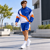 Survêtement personnalisé à blocs de couleur avec fermeture éclair quart de tour pour homme, veste coupe-vent et short de sport avec logo imprimé pour l'entraînement athlétique