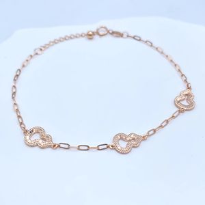 กำไลข้อมือทองคำขาว 18K รุ่น Xinfly ดีไซน์หรูหราประดับดอกไม้และลายฟักทอง - Product Image 1