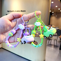 Dessin animé amusant fraise ours course porte-clés mignon tendance voiture porte-clés délicat couple sac pendentif porte-clés