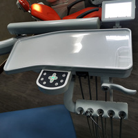 Fauteuil dentaire ergonomique avec système intégré de seringue chaude/froide, aspiration et éclairage LED pour interventions chirurgicales
