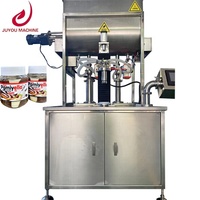 Ligne de remplissage automatique de bouteilles de pot de pâte à tartiner de crème au chocolat de confiture de sauce chili Machine de remplissage mixte bicolore