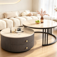 Table basse moderne noire à design rond avec rangement pour salon