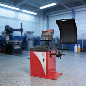 Machine d'équilibrage de pneus entièrement automatique de haute qualité, personnalisée et certifiée CE, avec mesure d'alignement des roues - Product Image 1