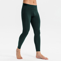 Pantalon de fitness pour homme en polyester uni, séchage rapide, coupe ajustée, extensible, avec cordon de serrage, respirant, pour la course et l'entraînement