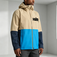 Veste de randonnée imperméable à capuche pour homme, avec blocs de couleur, logo personnalisé, coupe-vent, streetwear décontracté pour l'extérieur