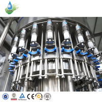 Machine de remplissage d'eau pure monobloc 12000 bph, usine d'embouteillage d'eau minérale pour usine de bouteilles en plastique PET