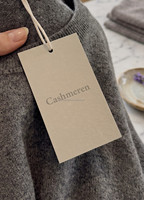 Étiquettes personnalisées imprimées pour vêtements avec cordon en coton beige et attache à bouton-pression pour l'emballage de vêtements et de prêt-à-porter en détail