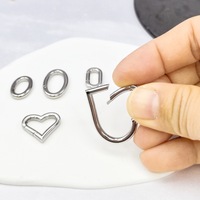 Bijoux de bricolage en acier inoxydable boucle ovale piste coeur boucle collier sac en acier inoxydable suspendus résultats de bijoux composants
