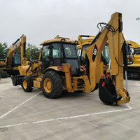 Chargeuse-pelleteuse Caterpillar CAT420F d'occasion, combinant fonctions de creusement et de chargement, avec bras télescopique, pour travaux de terrassement, équivalente à la chargeuse-pelleteuse Cat 416E.