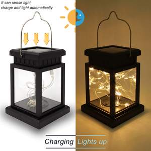 โคมไฟพลังงานแสงอาทิตย์โลหะสีดำพร้อมไฟประดับตกแต่งสำหรับวางบนโต๊ะและแขวนสำหรับสวน ระเบียง และงานอีเว้นท์ - Product Image 1