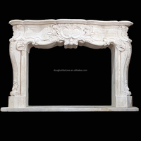 Cheminée en travertin romain de style Louis XV de conception européenne d'intérieur française cheminée en pierre blanche sculptée à la main en marbre