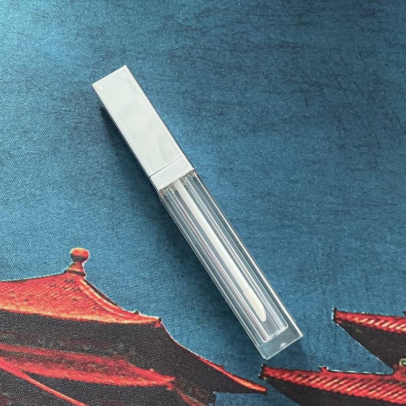 clear tube with shiny silver top