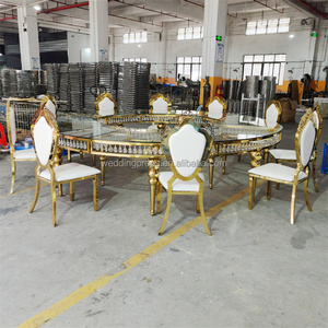 <span class=keywords><strong>Mesa</strong></span> de <span class=keywords><strong>comedor</strong></span> de <span class=keywords><strong>acero</strong></span> inoxidable dorado con decoración de <span class=keywords><strong>cristal</strong></span> <span class=keywords><strong>Mesa</strong></span> de serpiente de <span class=keywords><strong>cristal</strong></span> redonda para bodas <span class=keywords><strong>y</strong></span> restaurantes - Product Image 3
