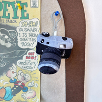 En gros : Porte-clés mignon en forme d'appareil photo, Pendentif en peluche pour sac à dos, Poupée, Poupée de machine à griffes, Porte-clés ampoule