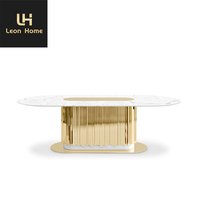 Table à manger de dernière génération avec design en acier inoxydable, plateau en marbre, ensemble de table à manger de luxe avec chaises, meubles