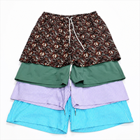 Short de bain pour homme à motifs color block, séchage rapide, avec cordon de serrage, taille mi-haute, en polyester tissé, longueur courte