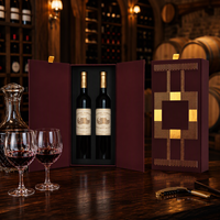 Boîte de luxe haut de gamme à double porte magnétique pour deux bouteilles de vin ou spiritueux, avec finition douce au toucher, dorure à chaud et lamination mate, et insert en EVA.