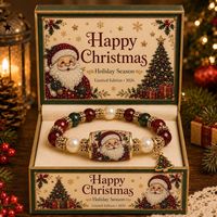 Bracelet perlé rouge et vert personnalisé avec breloque Père Noël, élastique, pour femme, idéal comme cadeau de Noël ou pour le petit cadeau de Noël dans le bas de la cheminée