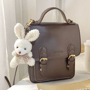 Mini lapin en peluche de 8 cm, doux et rembourré, avec nœud papillon, style poupée, idéal comme porte-clés ou cadeau pour mariage et fêtes - Product Image 1