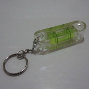 Llavero de plástico transparente con nivel de burbuja verde para proyectos de bricolaje - Product Image 1