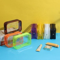 Vente en gros de trousses de maquillage personnalisées, grandes, imperméables, en PVC, à double fermeture éclair, transparentes, couleur bonbon, pochette cosmétique transparente