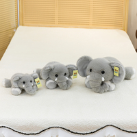 Vente en gros Grand éléphant couché en peluche, animal en peluche câlin, éléphant bébé pour la tête, idéal pour la chambre d'enfant et le canapé, cadeau