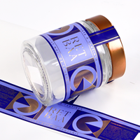Étiquettes personnalisées avec logo, bouteille en verre bleue, rouleau adhésif, impression personnalisée imperméable pour l'emballage des produits, provenant du fabricant