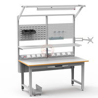 Banc de travail modulaire polyvalent réglable en hauteur, anti-statique, robuste, avec moteur, pour applications industrielles en entrepôt