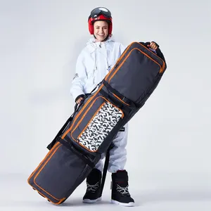 Große wasserdichte Flug-Ski-Reise-Ausrüstung Stiefel Ski-Rücksack gepolsterte Walze Snowboard-Tasche mit Rädern und Schutzgürteln