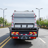 Compacteur de déchets électrique Howo 12CBM |   Batterie LFP 247 kWh |   Autonomie de 300 km |   4x2 |   Chargeur arrière |   Assainissement municipal Déchets urbains
