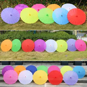 Vente en gros de 32 pouces Parasol en papier huile de haute qualité Parapluie indien en papier bambou pour mariage Demoiselles d'honneur Party Favors - Product Image 1
