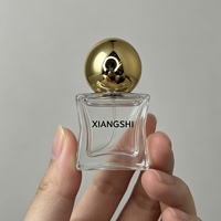 Flacon de parfum 18 ml en verre sérigraphié artistique en forme d'étoile, avec pulvérisateur à brume fine, bouchon sphérique en verre silex et pompe en carton