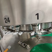Machine de remplissage et d'embouteillage électronique quantitative de haute précision à 24 têtes pour la vodka, le whisky, le brandy, l'alcool, les liqueurs, les spiritueux