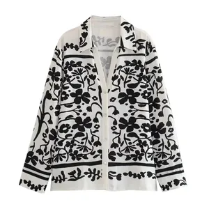 Floral print white and black color buttons up long sleeve turn down collar casual tops for women
