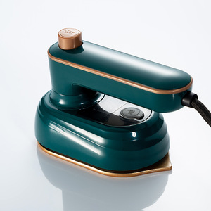 Mini Défroisseur Vapeur Portable Électrique Rotatif avec Câble, Couleurs Vert et Blanc, pour Usage Domestique - Product Image 1