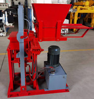 Machine à briques entièrement automatique pour blocs de béton emboîtables à haute compactation