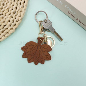 Llavero de hoja de pomelo de celebridad popular en internet (para alejar la mala suerte), diseño de hoja de cuero sintético, perfecto para el verano. - Product Image 2