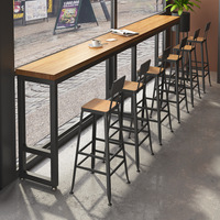 Ensemble table et chaises de bar style américain avec fenêtre, idéal pour salon de thé, table haute pour restaurant et bar de supérette