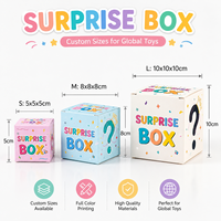 Coffret cadeau pour la Journée des enfants avec finition bronzée, doublure en éponge, design pliable, thème de dessin animé mignon, jouets surprise