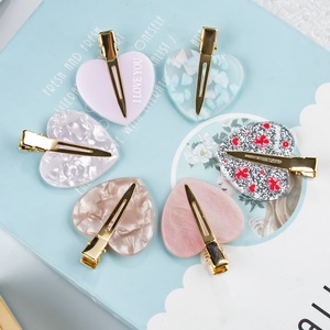 Kinling OEM elegante nuevo diseño de forma de amor 5cm Color cálido letra LOGO impresión PVC para ocasiones de fiesta pinzas para el cabello sin costuras - Product Image 3