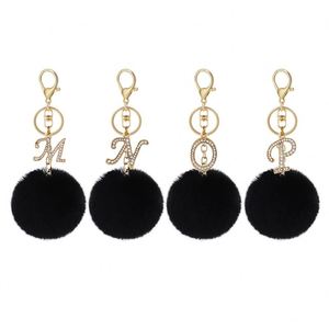 Porte-clés personnalisé avec 26 lettres anglaises en fourrure, nouveau design, boule de fourrure de lapin Rex artificielle, pendentif de sac, porte-clés en peluche avec lettre - Product Image 3