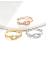 Élégante bague en argent 925 plaqué or 18 carats avec zircon croisé et pavé de CZ entrelacés