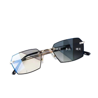 Lunettes de lecture anti-lumière bleue populaires pour hommes, verres transparents AC, montures optiques unisexes sans monture en métal, vente en gros