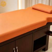 Table de massage durable en cuir PU avec base en bois, étagère ouverte et repose-mains pour salon de beauté et spa
