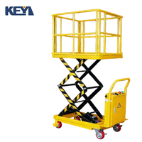 Plateforme élévatrice à ciseaux électrique KEYI, construction en acier allié, hauteur maximale 2 m, couvercle de protection, pieds pliables, alimentation DC/AC, 4 personnes