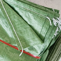 China produceert recyclebare groene PP geweven zakken van polypropyleen, leeg, 50KG 100kg, voor bouwafval, afval, zand, 55*95cm
